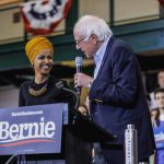 Representative Ilhan Omar with Senator Bernie Sanders at a campaign rally